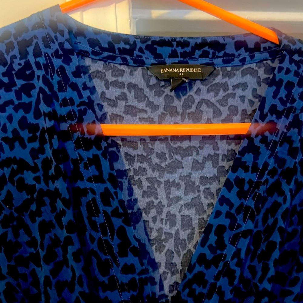 Great Condition. Worn once. Rich blue and black leopard print dress.